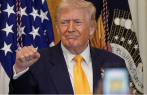 Trump - fist bump and grin